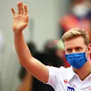 SPIELBERG, AUSTRIA - JULY 04: Mick Schumacher of Germany and Haas F1 waves to the crowd during the drivers parade ahead of the F1 Grand Prix of Austria at Red Bull Ring on July 04, 2021 in Spielberg, Austria. (Photo by Joe Portlock - Formula 1/Formula 1 via Getty Images)