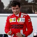 BAKU, AZERBAIJAN - JUNE 05: Pole position qualifier Charles Leclerc of Monaco and Ferrari celebrates in parc ferme during qualifying ahead of the F1 Grand Prix of Azerbaijan at Baku City Circuit on June 05, 2021 in Baku, Azerbaijan. (Photo by Maxim Shemetov - Pool/Getty Images)