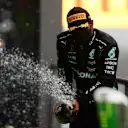 SPA, BELGIUM - AUGUST 29: Third placed Lewis Hamilton of Great Britain and Mercedes GP celebrates on the podium during the F1 Grand Prix of Belgium at Circuit de Spa-Francorchamps on August 29, 2021 in Spa, Belgium. (Photo by Mario Renzi - Formula 1/Formula 1 via Getty Images)