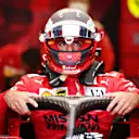 SAO PAULO, BRAZIL - NOVEMBER 14: Carlos Sainz of Spain and Ferrari prepares to drive in the garage before the F1 Grand Prix of Brazil at Autodromo Jose Carlos Pace on November 14, 2021 in Sao Paulo, Brazil. (Photo by Peter Fox/Getty Images)