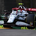 IMOLA, ITALY - APRIL 16: Antonio Giovinazzi of Italy driving the (99) Alfa Romeo Racing C41 Ferrari launches off a raised kerb during practice ahead of the F1 Grand Prix of Emilia Romagna at Autodromo Enzo e Dino Ferrari on April 16, 2021 in Imola, Italy. (Photo by Clive Mason - Formula 1/Formula 1 via Getty Images)