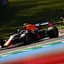 IMOLA, ITALY - APRIL 16: Sparks fly behind Sergio Perez of Mexico driving the (11) Red Bull Racing RB16B Honda during practice ahead of the F1 Grand Prix of Emilia Romagna at Autodromo Enzo e Dino Ferrari on April 16, 2021 in Imola, Italy. (Photo by Clive Mason - Formula 1/Formula 1 via Getty Images)