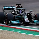 IMOLA, ITALY - APRIL 17: Lewis Hamilton of Great Britain driving the (44) Mercedes AMG Petronas F1 Team Mercedes W12 on track during qualifying ahead of the F1 Grand Prix of Emilia Romagna at Autodromo Enzo e Dino Ferrari on April 17, 2021 in Imola, Italy. (Photo by Bryn Lennon/Getty Images)