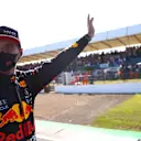 NORTHAMPTON, ENGLAND - JULY 17: Winner Max Verstappen of Netherlands and Red Bull Racing waves to the crowd on the Victory Lap during the Sprint for the F1 Grand Prix of Great Britain at Silverstone on July 17, 2021 in Northampton, England. (Photo by Dan Istitene - Formula 1/Formula 1 via Getty Images)