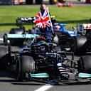 NORTHAMPTON, ENGLAND - JULY 18: Race winner Lewis Hamilton of Great Britain and Mercedes GP celebrates in parc ferme during the F1 Grand Prix of Great Britain at Silverstone on July 18, 2021 in Northampton, England. (Photo by Mark Thompson/Getty Images)