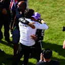 NORTHAMPTON, ENGLAND - JULY 18: Race winner Lewis Hamilton of Great Britain and Mercedes GP celebrates with Mercedes GP Executive Director Toto Wolff in parc ferme during the F1 Grand Prix of Great Britain at Silverstone on July 18, 2021 in Northampton, England. (Photo by Mario Renzi - Formula 1/Formula 1 via Getty Images)