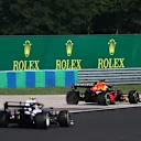 BUDAPEST, HUNGARY - AUGUST 01: Max Verstappen of the Netherlands driving the (33) Red Bull Racing RB16B Honda runs wide during the F1 Grand Prix of Hungary at Hungaroring on August 01, 2021 in Budapest, Hungary. (Photo by Bryn Lennon/Getty Images)
