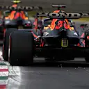 MONZA, ITALY - SEPTEMBER 10: Max Verstappen of the Netherlands driving the (33) Red Bull Racing RB16B Honda and Sergio Perez of Mexico driving the (11) Red Bull Racing RB16B Honda during qualifying ahead of the F1 Grand Prix of Italy at Autodromo di Monza on September 10, 2021 in Monza, Italy. (Photo by Rudy Carezzevoli/Getty Images)