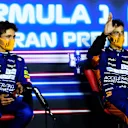 MONZA, ITALY - SEPTEMBER 12: Race winner Daniel Ricciardo of Australia and McLaren F1 and second placed Lando Norris of Great Britain and McLaren F1 talk in the press conference after the F1 Grand Prix of Italy at Autodromo di Monza on September 12, 2021 in Monza, Italy. (Photo by Rudy Carezzevoli/Getty Images)