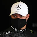 MEXICO CITY, MEXICO - NOVEMBER 05: Valtteri Bottas of Finland and Mercedes GP looks on in the garage during practice ahead of the F1 Grand Prix of Mexico at Autodromo Hermanos Rodriguez on November 05, 2021 in Mexico City, Mexico. (Photo by Lars Baron/Getty Images)