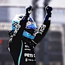 MEXICO CITY, MEXICO - NOVEMBER 06: Pole position qualifier Valtteri Bottas of Finland and Mercedes GP celebrates in parc ferme during qualifying ahead of the F1 Grand Prix of Mexico at Autodromo Hermanos Rodriguez on November 06, 2021 in Mexico City, Mexico. (Photo by Lars Baron/Getty Images)
