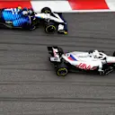 SOCHI, RUSSIA - SEPTEMBER 26: Nikita Mazepin of Russia driving the (9) Haas F1 Team VF-21 Ferrari leads Nicholas Latifi of Canada driving the (6) Williams Racing FW43B Mercedes during the F1 Grand Prix of Russia at Sochi Autodrom on September 26, 2021 in Sochi, Russia. (Photo by Rudy Carezzevoli/Getty Images)