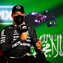 JEDDAH, SAUDI ARABIA - DECEMBER 05: Third placed Valtteri Bottas of Finland and Mercedes GP talks in the press conference after the F1 Grand Prix of Saudi Arabia at Jeddah Corniche Circuit on December 05, 2021 in Jeddah, Saudi Arabia. (Photo by Sam Bloxham - Pool/Getty Images)