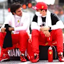 SPIELBERG, AUSTRIA - JUNE 27: Carlos Sainz of Spain and Ferrari and Charles Leclerc of Monaco and Ferrari talk on the grid ahead of the F1 Grand Prix of Styria at Red Bull Ring on June 27, 2021 in Spielberg, Austria. (Photo by Dan Istitene - Formula 1/Formula 1 via Getty Images)