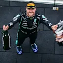 ISTANBUL, TURKEY - OCTOBER 10: Valterri Bottas of Mercedes and Finland celebrates winning during the F1 Grand Prix of Turkey at Intercity Istanbul Park on October 10, 2021 in Istanbul, Turkey. (Photo by Peter Fox/Getty Images)