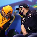 MELBOURNE, AUSTRALIA - APRIL 08: Max Verstappen of the Netherlands and Oracle Red Bull Racing talks with Lando Norris of Great Britain and McLaren in the Drivers Press Conference prior to practice ahead of the F1 Grand Prix of Australia at Melbourne Grand Prix Circuit on April 08, 2022 in Melbourne, Australia. (Photo by Robert Cianflone/Getty Images)