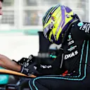 BAKU, AZERBAIJAN - JUNE 12: Fourth placed Lewis Hamilton of Great Britain and Mercedes is assisted from his car after complaining of pain during the F1 Grand Prix of Azerbaijan at Baku City Circuit on June 12, 2022 in Baku, Azerbaijan. (Photo by Bryn Lennon - Formula 1/Formula 1 via Getty Images)