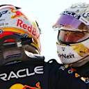 BAKU, AZERBAIJAN - JUNE 12: Race winner Max Verstappen of the Netherlands and Oracle Red Bull Racing and Second placed Sergio Perez of Mexico and Oracle Red Bull Racing celebrate in parc ferme during the F1 Grand Prix of Azerbaijan at Baku City Circuit on June 12, 2022 in Baku, Azerbaijan. (Photo by Dan Istitene - Formula 1/Formula 1 via Getty Images)