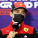 BAHRAIN, BAHRAIN - MARCH 18: Charles Leclerc of Monaco and Ferrari talks in the Drivers Press Conference before practice ahead of the F1 Grand Prix of Bahrain at Bahrain International Circuit on March 18, 2022 in Bahrain, Bahrain. (Photo by Clive Rose/Getty Images)