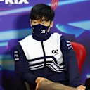 BAHRAIN, BAHRAIN - MARCH 18: Yuki Tsunoda of Japan and Scuderia AlphaTauri talks in the Drivers Press Conference before practice ahead of the F1 Grand Prix of Bahrain at Bahrain International Circuit on March 18, 2022 in Bahrain, Bahrain. (Photo by Lars Baron/Getty Images)