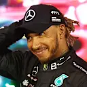 BAHRAIN, BAHRAIN - MARCH 20: Third placed Lewis Hamilton of Great Britain and Mercedes smiles in parc ferme during the F1 Grand Prix of Bahrain at Bahrain International Circuit on March 20, 2022 in Bahrain, Bahrain. (Photo by Clive Rose - Formula 1/Formula 1 via Getty Images)