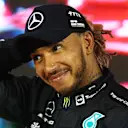 BAHRAIN, BAHRAIN - MARCH 20: Third placed Lewis Hamilton of Great Britain and Mercedes looks on in parc ferme during the F1 Grand Prix of Bahrain at Bahrain International Circuit on March 20, 2022 in Bahrain, Bahrain. (Photo by Clive Rose - Formula 1/Formula 1 via Getty Images)