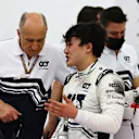 BAHRAIN, BAHRAIN - MARCH 11: Yuki Tsunoda of Japan and Scuderia AlphaTauri talks to Scuderia AlphaTauri Team Principal Franz Tost in the garage during Day Two of F1 Testing at Bahrain International Circuit on March 11, 2022 in Bahrain, Bahrain. (Photo by Lars Baron/Getty Images)