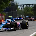 MONTREAL, QUEBEC - JUNE 19: Esteban Ocon of France driving the (31) Alpine F1 A522 Renault leads George Russell of Great Britain driving the (63) Mercedes AMG Petronas F1 Team W13 during the F1 Grand Prix of Canada at Circuit Gilles Villeneuve on June 19, 2022 in Montreal, Quebec. (Photo by Lars Baron - Formula 1/Formula 1 via Getty Images)