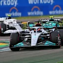 IMOLA, ITALY - APRIL 23: George Russell of Great Britain driving the (63) Mercedes AMG Petronas F1 Team W13 leads Sebastian Vettel of Germany driving the (5) Aston Martin AMR22 Mercedes during Sprint ahead of the F1 Grand Prix of Emilia Romagna at Autodromo Enzo e Dino Ferrari on April 23, 2022 in Imola, Italy. (Photo by Dan Mullan/Getty Images)