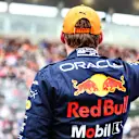 SUZUKA, JAPAN - OCTOBER 08: Pole position qualifier Max Verstappen of the Netherlands and Oracle Red Bull Racing celebrates in parc ferme during qualifying ahead of the F1 Grand Prix of Japan at Suzuka International Racing Course on October 08, 2022 in Suzuka, Japan. (Photo by Mark Thompson/Getty Images )
