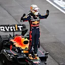SUZUKA, JAPAN - OCTOBER 09: Race winner and 2022 F1 World Drivers Champion Max Verstappen of Netherlands and Oracle Red Bull Racing celebrates in parc ferme during the F1 Grand Prix of Japan at Suzuka International Racing Course on October 09, 2022 in Suzuka, Japan. (Photo by Clive Mason/Getty Images)