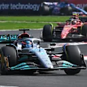 MEXICO CITY, MEXICO - OCTOBER 30: George Russell of Great Britain driving the (63) Mercedes AMG Petronas F1 Team W13 leads Carlos Sainz of Spain driving (55) the Ferrari F1-75 on track during the F1 Grand Prix of Mexico at Autodromo Hermanos Rodriguez on October 30, 2022 in Mexico City, Mexico. (Photo by Clive Mason - Formula 1/Formula 1 via Getty Images)