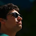 MIAMI, FLORIDA - MAY 08: Lance Stroll of Canada and Aston Martin F1 Team looks on in the Paddock prior to the F1 Grand Prix of Miami at the Miami International Autodrome on May 08, 2022 in Miami, Florida. (Photo by Clive Mason - Formula 1/Formula 1 via Getty Images)