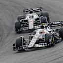 ZANDVOORT, NETHERLANDS - SEPTEMBER 04: Yuki Tsunoda of Scuderia AlphaTauri and Japan leads Pierre Gasly of Scuderia AlphaTauri and France  during the F1 Grand Prix of The Netherlands at Circuit Zandvoort on September 04, 2022 in Zandvoort, Netherlands. (Photo by Peter Fox/Getty Images)