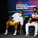 JEDDAH, SAUDI ARABIA - MARCH 25: Lewis Hamilton of Great Britain and Mercedes and Zhou Guanyu of China and Alfa Romeo F1 attend the Drivers Press Conference before practice ahead of the F1 Grand Prix of Saudi Arabia at the Jeddah Corniche Circuit on March 25, 2022 in Jeddah, Saudi Arabia. (Photo by Clive Mason/Getty Images)