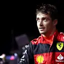 SINGAPORE, SINGAPORE - OCTOBER 01: Pole position qualifier Charles Leclerc of Monaco and Ferrari looks on in parc ferme during qualifying ahead of the F1 Grand Prix of Singapore at Marina Bay Street Circuit on October 01, 2022 in Singapore, Singapore. (Photo by Dan Istitene - Formula 1/Formula 1 via Getty Images)