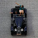 SINGAPORE, SINGAPORE - OCTOBER 02: Sebastian Vettel of Germany and Aston Martin F1 Team waves to the crowd on the drivers parade prior to the F1 Grand Prix of Singapore at Marina Bay Street Circuit on October 02, 2022 in Singapore, Singapore. (Photo by Bryn Lennon - Formula 1/Formula 1 via Getty Images)