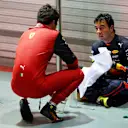 SINGAPORE, SINGAPORE - OCTOBER 02: Race winner Sergio Perez of Mexico and Oracle Red Bull Racing and Third placed Carlos Sainz of Spain and Ferrari celebrate in parc ferme during the F1 Grand Prix of Singapore at Marina Bay Street Circuit on October 02, 2022 in Singapore, Singapore. (Photo by Clive Rose/Getty Images,)
