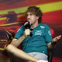 BARCELONA, SPAIN - MAY 20: Sebastian Vettel of Germany and Aston Martin F1 Team talks in the Drivers Press Conference prior to practice ahead of the F1 Grand Prix of Spain at Circuit de Barcelona-Catalunya on May 20, 2022 in Barcelona, Spain. (Photo by Bryn Lennon/Getty Images)
