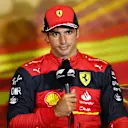 BARCELONA, SPAIN - MAY 21: Third placed qualifier Carlos Sainz of Spain and Ferrari talks in the press conference after qualifying ahead of the F1 Grand Prix of Spain at Circuit de Barcelona-Catalunya on May 21, 2022 in Barcelona, Spain. (Photo by Dan Istitene - Formula 1/Formula 1 via Getty Images)