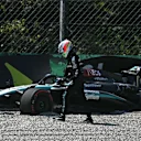 Mercedes' Italian driver Andrea Kimi Antonelli leaves his car after crashing during first practice session, ahead of the Italian Formula One Grand Prix at Autodromo Nazionale Monza circuit, in Monza on August 30, 2024. (Photo by Gabriel BOUYS / AFP) (Photo by GABRIEL BOUYS/AFP via Getty Images)