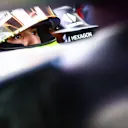 ABU DHABI, UNITED ARAB EMIRATES - NOVEMBER 24: Isack Hadjar of France and Red Bull Racing prepares to drive in the garage during practice ahead of the F1 Grand Prix of Abu Dhabi at Yas Marina Circuit on November 24, 2023 in Abu Dhabi, United Arab Emirates. (Photo by Mark Thompson/Getty Images)