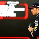 ABU DHABI, UNITED ARAB EMIRATES - NOVEMBER 25: Pole position qualifier Max Verstappen of the Netherlands and Oracle Red Bull Racing looks on in parc ferme during qualifying ahead of the F1 Grand Prix of Abu Dhabi at Yas Marina Circuit on November 25, 2023 in Abu Dhabi, United Arab Emirates. (Photo by Mark Thompson/Getty Images)