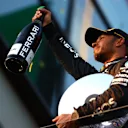 MELBOURNE, AUSTRALIA - APRIL 02: Second placed Lewis Hamilton of Great Britain and Mercedes celebrates on the podium during the F1 Grand Prix of Australia at Albert Park Grand Prix Circuit on April 02, 2023 in Melbourne, Australia. (Photo by Dan Istitene - Formula 1/Formula 1 via Getty Images)