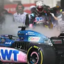 BAKU, AZERBAIJAN - APRIL 28: Pierre Gasly of France and Alpine F1 looks on as the fire in his car is put out during practice ahead of the F1 Grand Prix of Azerbaijan at Baku City Circuit on April 28, 2023 in Baku, Azerbaijan. (Photo by Francois Nel/Getty Images)