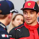 BAKU, AZERBAIJAN - APRIL 28: Pole position qualifier Charles Leclerc of Monaco and Ferrari talks with Second placed qualifier Max Verstappen of the Netherlands and Oracle Red Bull Racing in parc ferme during qualifying ahead of the F1 Grand Prix of Azerbaijan at Baku City Circuit on April 28, 2023 in Baku, Azerbaijan. (Photo by Bryn Lennon - Formula 1/Formula 1 via Getty Images)