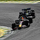 SAO PAULO, BRAZIL - NOVEMBER 05: Sergio Perez of Mexico driving the (11) Oracle Red Bull Racing RB19 leads Lewis Hamilton of Great Britain driving the (44) Mercedes AMG Petronas F1 Team W14 during the F1 Grand Prix of Brazil at Autodromo Jose Carlos Pace on November 05, 2023 in Sao Paulo, Brazil. (Photo by Rudy Carezzevoli/Getty Images)