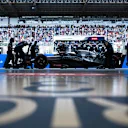 SAO PAULO, BRAZIL - NOVEMBER 03: Daniel Ricciardo of Australia and Scuderia AlphaTauri is pushed back into the garage during qualifying ahead of the F1 Grand Prix of Brazil at Autodromo Jose Carlos Pace on November 03, 2023 in Sao Paulo, Brazil. (Photo by Rudy Carezzevoli/Getty Images)