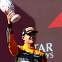 BUDAPEST, HUNGARY - JULY 23: Second placed Lando Norris of Great Britain and McLaren celebrates on the podium during the F1 Grand Prix of Hungary at Hungaroring on July 23, 2023 in Budapest, Hungary. (Photo by Peter Fox/Getty Images)