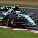 SUZUKA, JAPAN - SEPTEMBER 22: Fernando Alonso of Spain driving the (14) Aston Martin AMR23 Mercedes on track during practice ahead of the F1 Grand Prix of Japan at Suzuka International Racing Course on September 22, 2023 in Suzuka, Japan. (Photo by Bryn Lennon - Formula 1/Formula 1 via Getty Images)